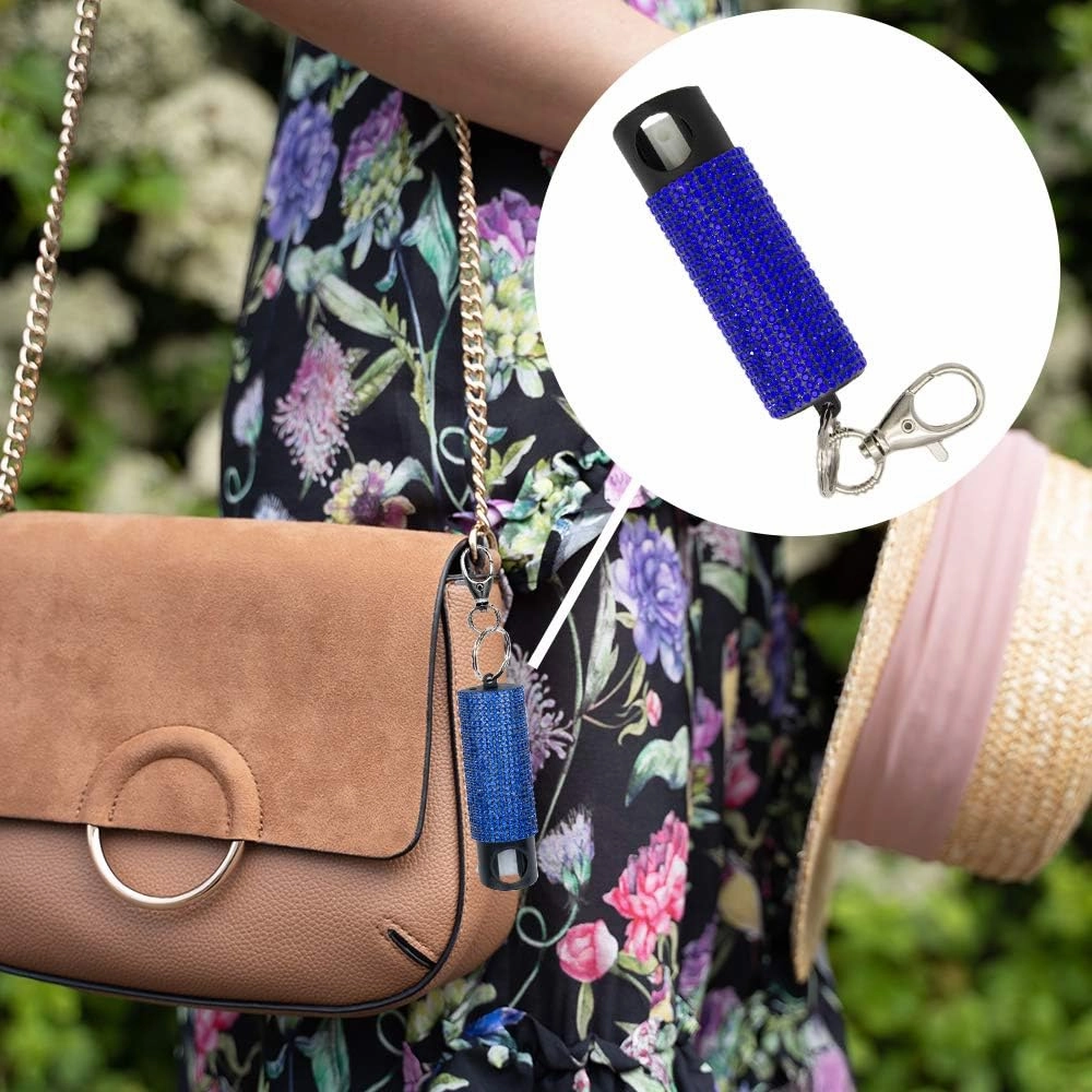 Guard Dog Security Bling it On Pepper Spray Keychain with Safety Twist Top Mini and Easy Carry Lightweight and Fashionable Maximum Police Strength OC Spray 16 Feet Range 0.5 fl oz